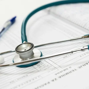 Stethoscope and medical chart representing professional medical examinations at Weston Medical Clinic by Dr. Phanor Calle.