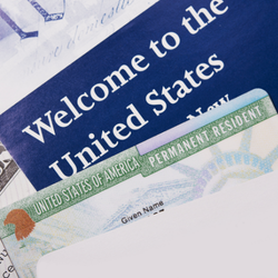Permanent Resident Card (Green Card) and U.S. immigration documents representing USCIS Form I-693 immigration medical exams performed by Dr. Phanor Calle, USCIS-designated Civil Surgeon at Weston Medical Clinic in Weston, Florida.